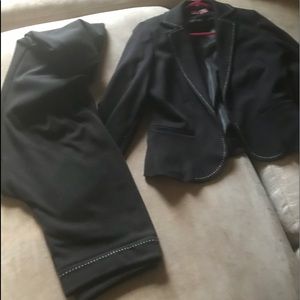 Black pants and black jacket